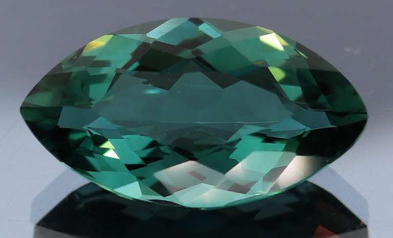 19.77ct top blue green hue created Amethyst