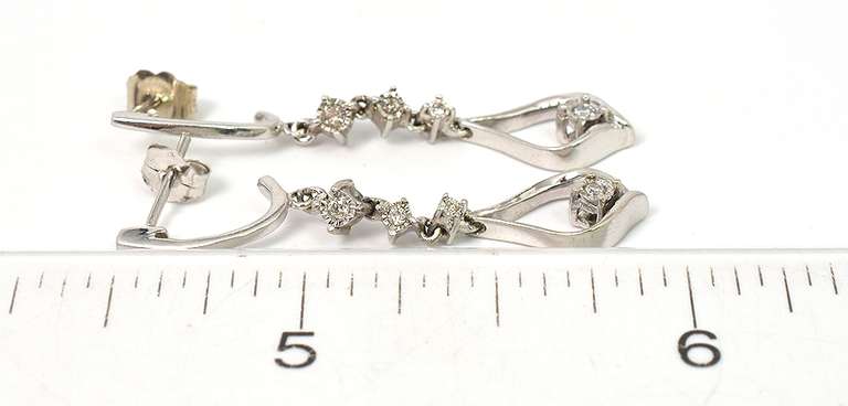 Sparkling Diamond Dangle Earrings in White Gold