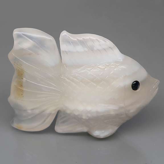 Gorgeous 86.78ct striped Agate and Sapphire carving