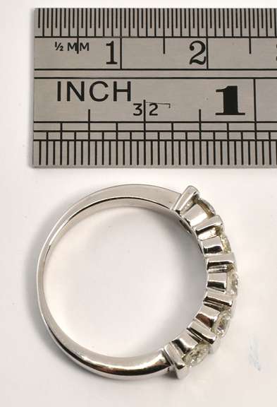 Stylish 1 Ct. T.w. WG Channel Set Band