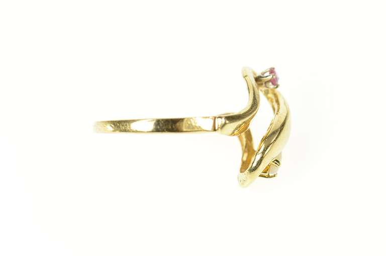 10K Yellow Gold Marquise Opal Ruby Accent Ribbon Bypass Ring