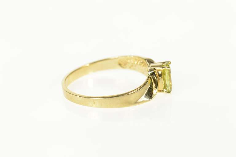 10K Yellow Gold Oval Peridot Solitaire Curved Design Simple Ring