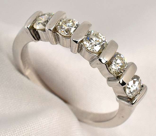 Stylish 1 Ct. T.w. WG Channel Set Band