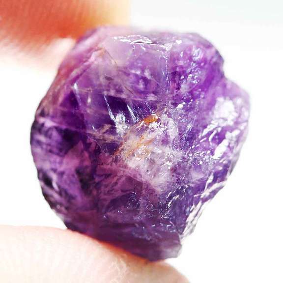 Collectors rich untreated 19.43ct uncut Amethyst