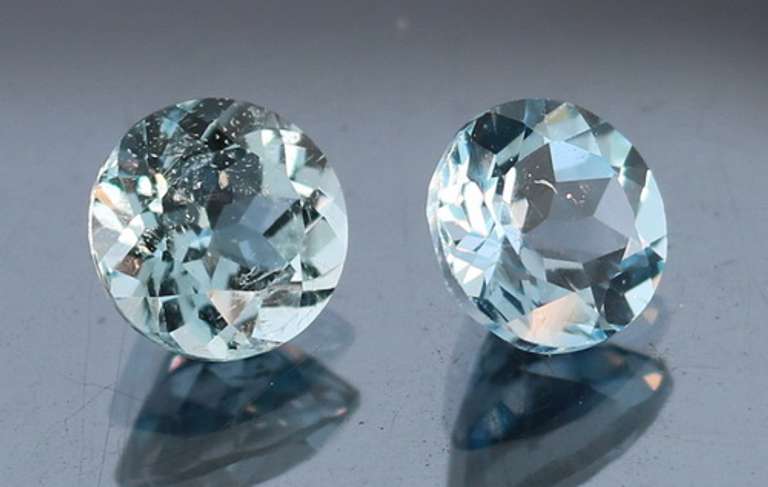 Heavy 5ct vivid sky blue Topaz set