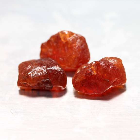 Rich 24.67ct uncut Garnet set