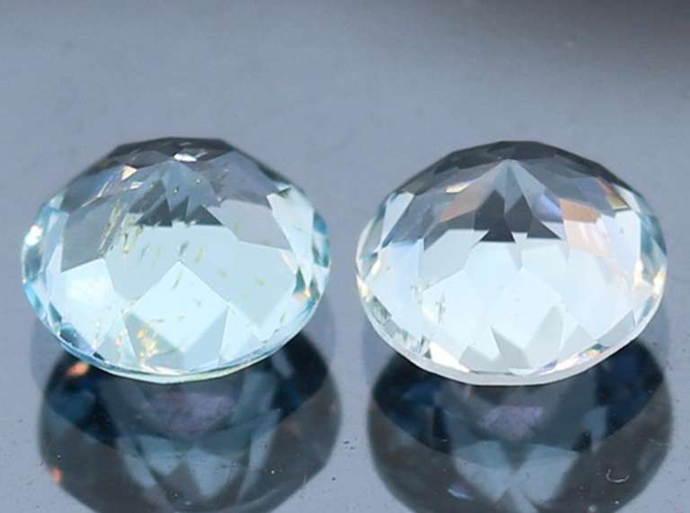 Heavy 5.02ct vivid sky blue Topaz set