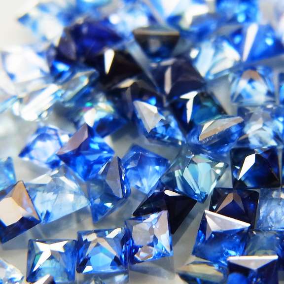 Vivid blue 3.76ct princess radiant cut Sapphire set