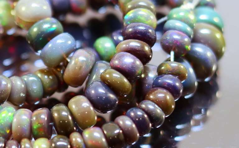 Fantastic! 92ct Ethiopian Black Opal set!