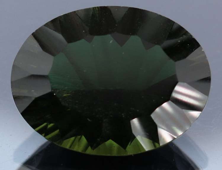 Unique 14.30ct greenish black created Amethyst