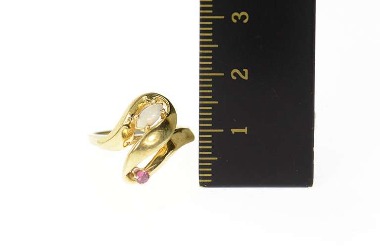 10K Yellow Gold Marquise Opal Ruby Accent Ribbon Bypass Ring