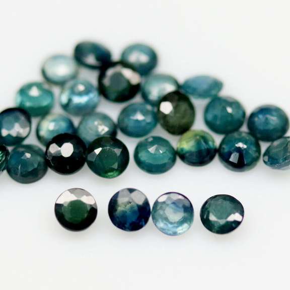 Multi-hue 6.48ct natural blue Sapphire set