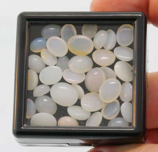 Heavy 40.08ct set of snow white Opals!