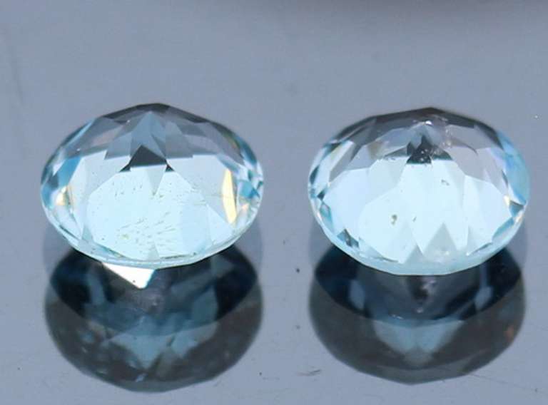 Heavy 4.85ct vivid sky blue Topaz set