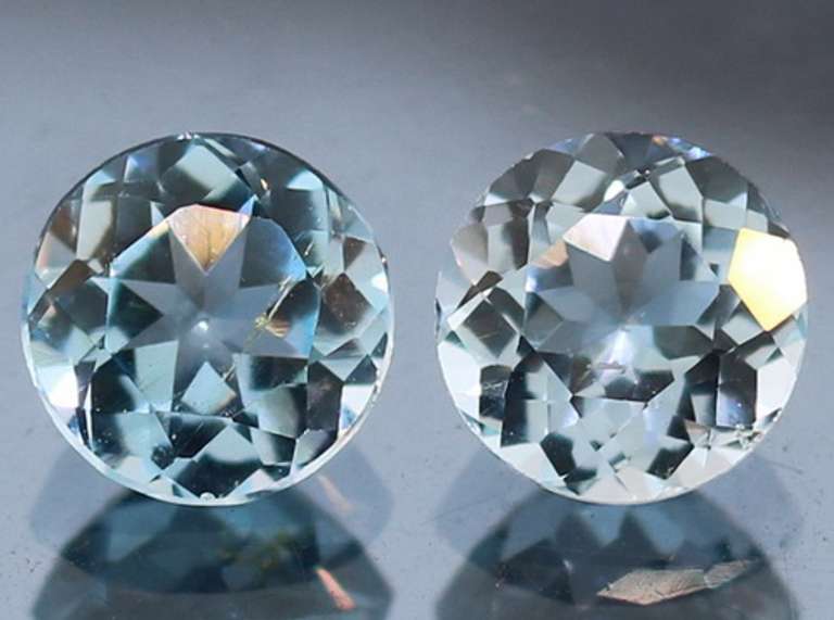 Heavy 5.02ct vivid sky blue Topaz set