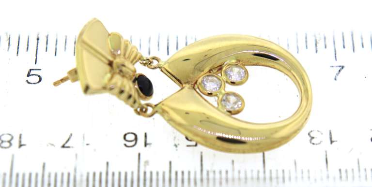 Powerful 18kt Bow and Oval Drop Earrings