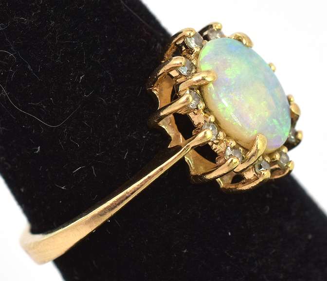 Breathtaking Opal & Diamond Accent Ring in Yellow Gold