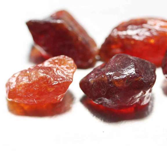 Heavy 27.97ct uncut Garnet set