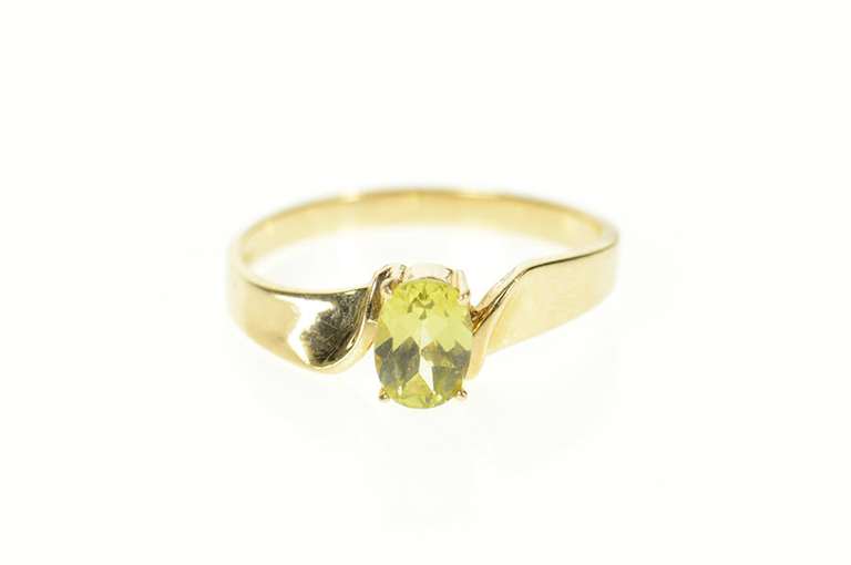 10K Yellow Gold Oval Peridot Solitaire Curved Design Simple Ring