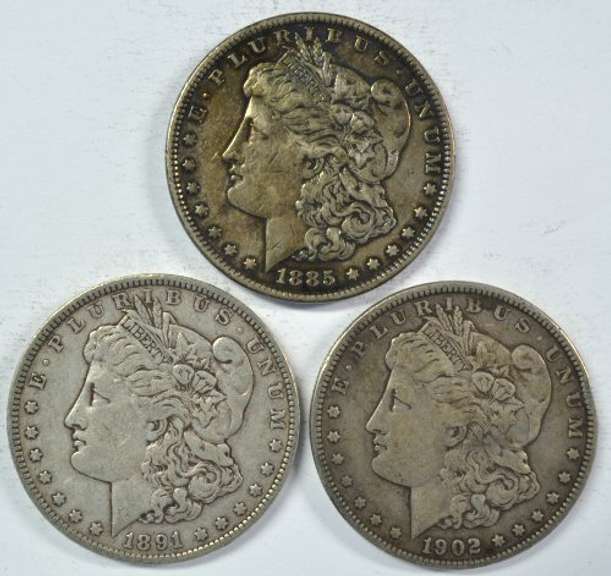 1885, 1891, & 1902 Morgan Silver Dollars. Sharp circs