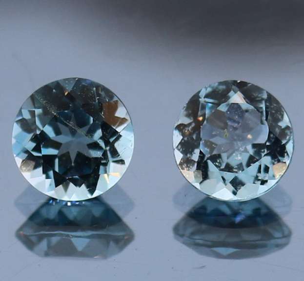 Heavy 4.85ct vivid sky blue Topaz set