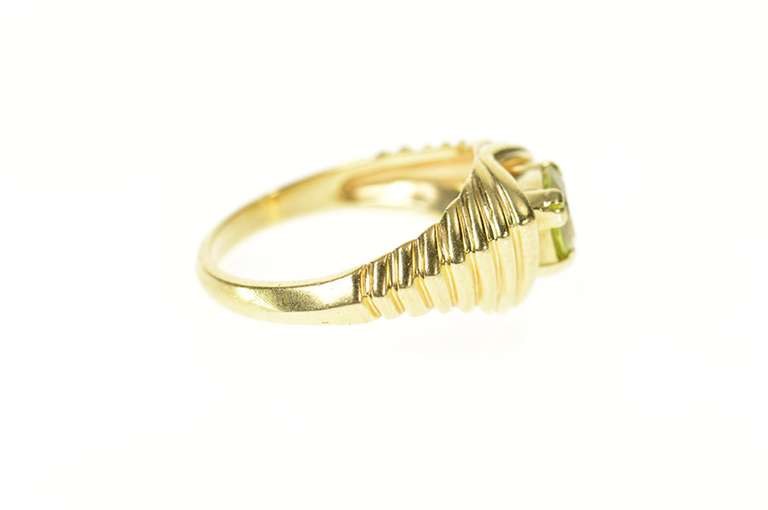 10K Yellow Gold Trillion Peridot Grooved Design Statement Ring
