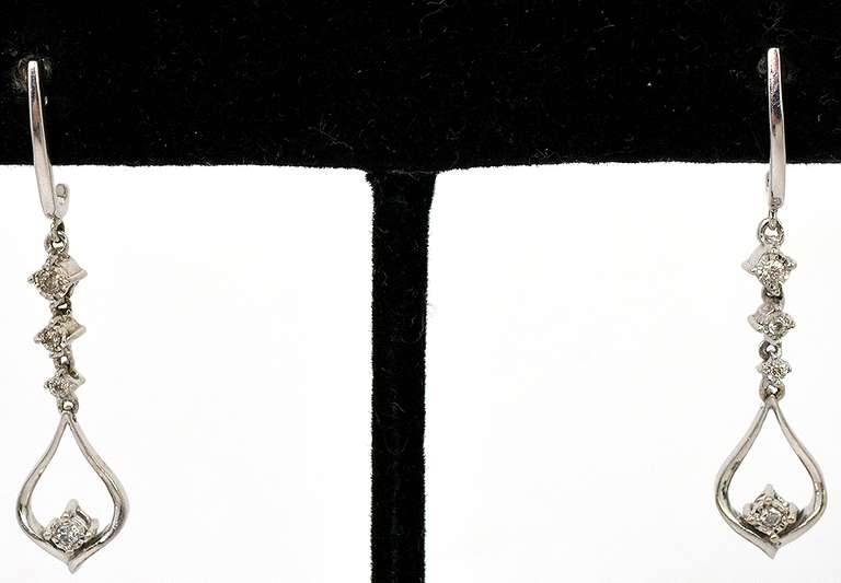 Sparkling Diamond Dangle Earrings in White Gold