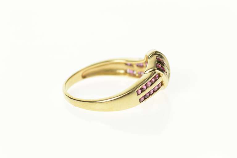 14K Yellow Gold Ruby Channel Knot Design Statement Ring