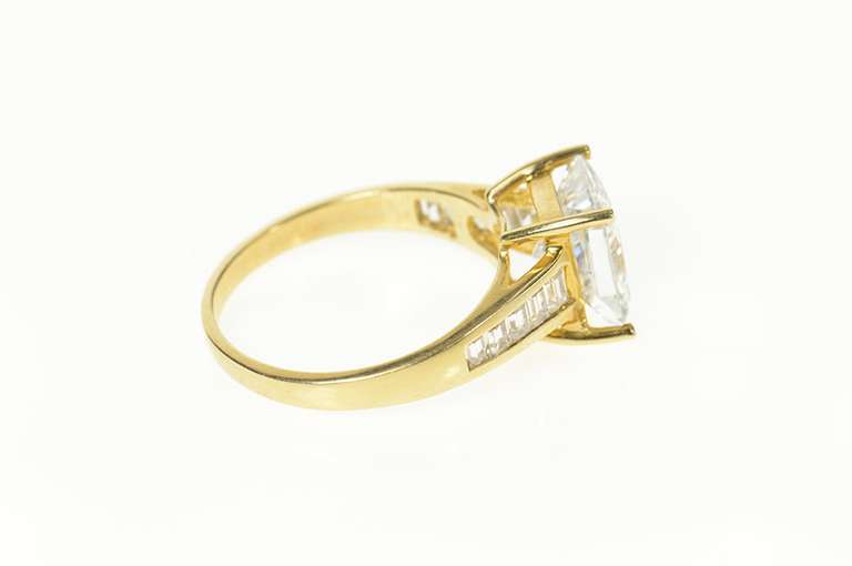 10K Yellow Gold Emerald Cubic Zirconia Travel Engagement Ring