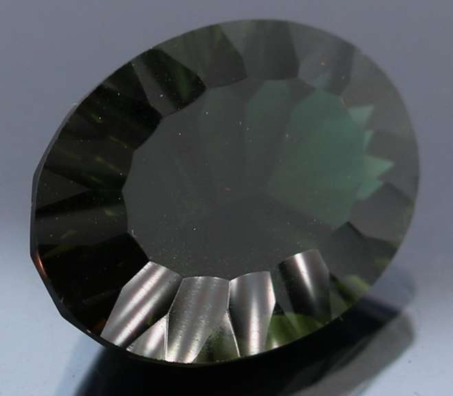 Unique 14.30ct greenish black created Amethyst
