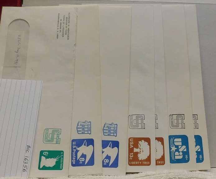 7 ea Re-Valued postal envelopes
