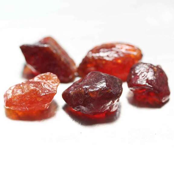 Heavy 27.97ct uncut Garnet set