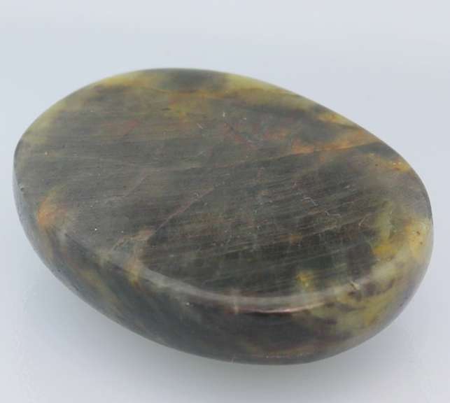 Stunning 451ct untreated black and yellow Sapphire cabochon