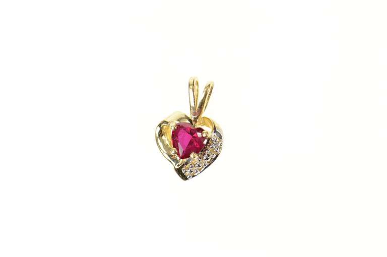 10K Yellow Gold Heart Syn. Ruby Diamond Accent Love Symbol Pendant