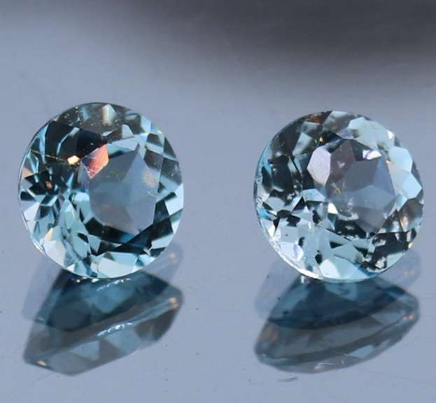 Heavy 4.85ct vivid sky blue Topaz set