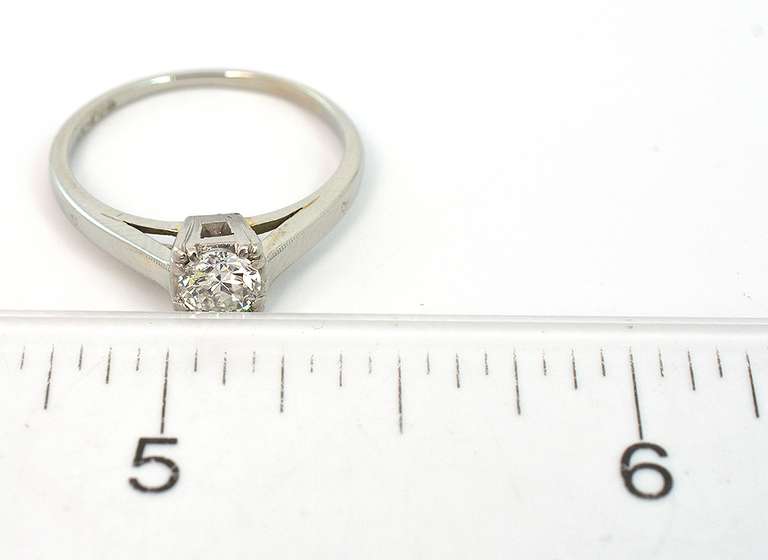 Glittering 1/3CT Cathedral-Mount Diamond Solitaire Ring in 14KT White Gold