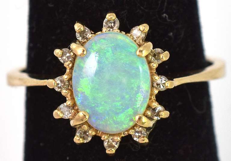 Breathtaking Opal & Diamond Accent Ring in Yellow Gold