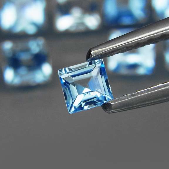 Vivid! 7.90ct radiant princess cut Swiss blue Topaz set