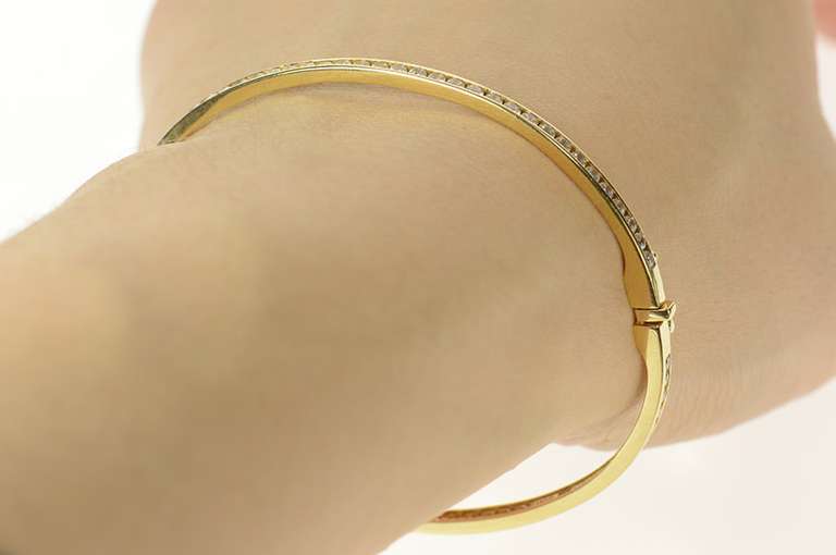 14K Yellow Gold Classic Oval Bangle Channel Cubic Zirconia Bracelet