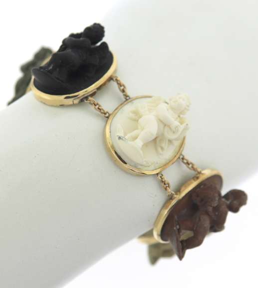 Memorable Seven Oval Shaped Bezel Set Lava Stones & Shell Cameos Bracelet