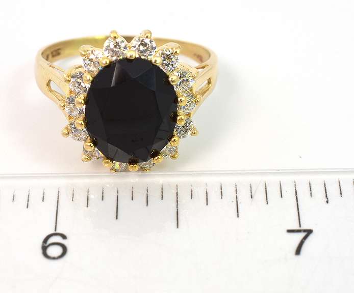 Striking Black Garnet and CZ Halo Ring in Yellow Gold