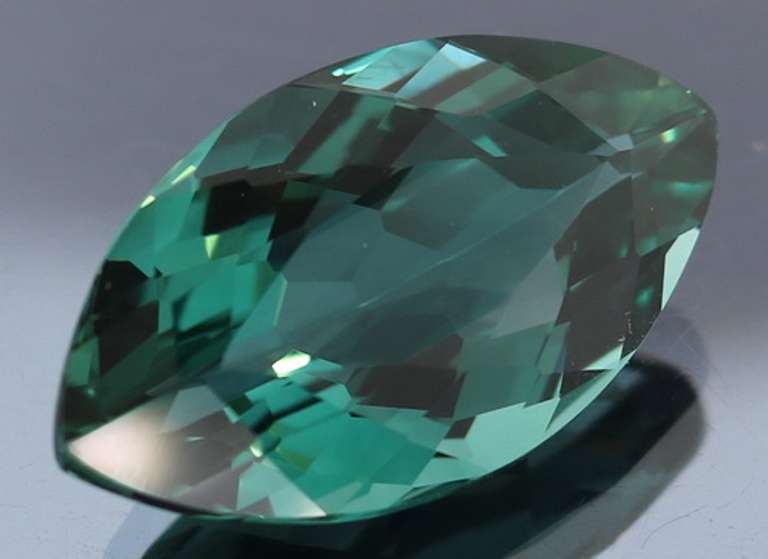 19.77ct top blue green hue created Amethyst