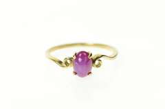 10K Yellow Gold Oval Syn. Pink Star Ruby Cabochon Swirl Ring