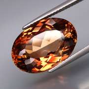 Lavish 13.87ct oval cut Imperial Topaz