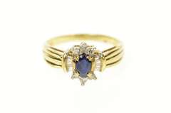 10K Yellow Gold Oval Sapphire Baguette Diamond Halo Ring