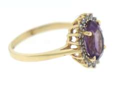 Dreamy Yellow Gold Oval Amethyst Halo Ring
