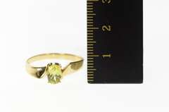 10K Yellow Gold Oval Peridot Solitaire Curved Design Simple Ring
