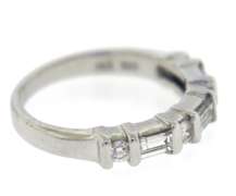 Remarkable 14kt WG Baguette and Round Brilliant Cut Diamond Ring