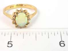 Breathtaking Opal & Diamond Accent Ring in Yellow Gold