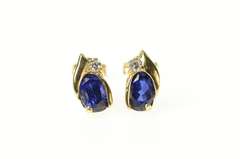 14K Yellow Gold Oval Syn. Sapphire CZ Accent Stud Earrings